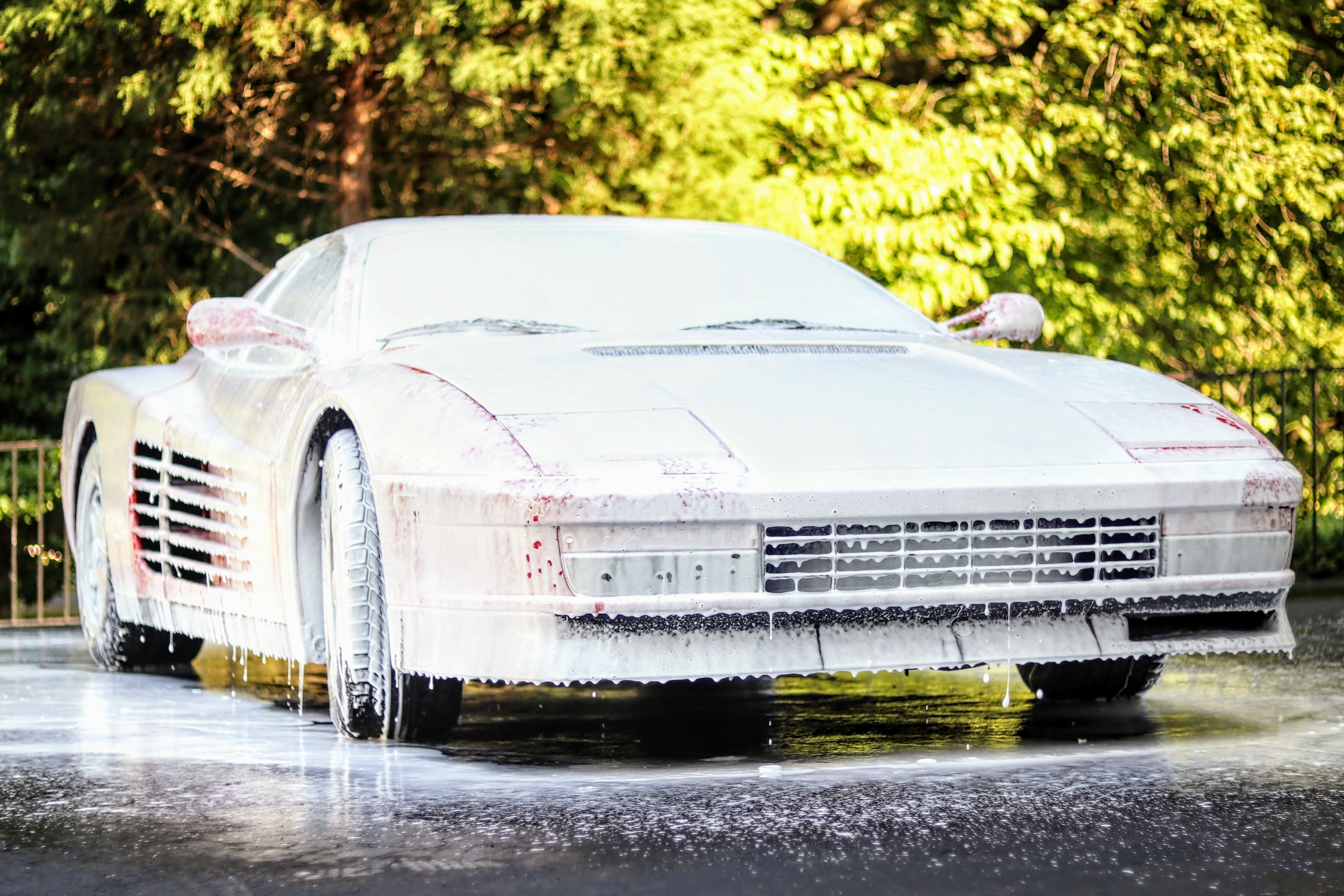 Ferrari Testarossa completely covered with foam